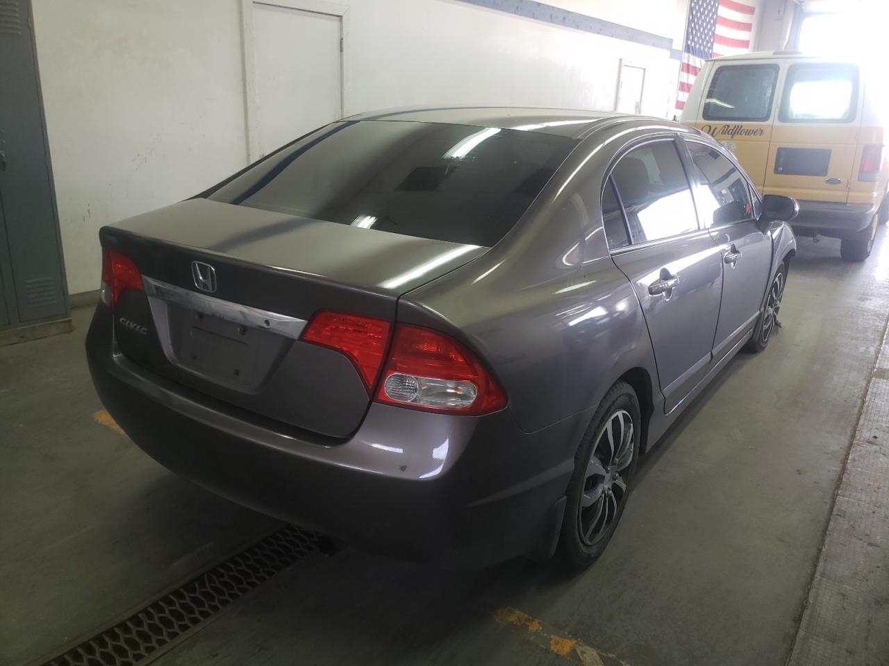 Photo 4 from auction – 2010 HONDA CIVIC LX with VIN 2HGFA1F59AH566236