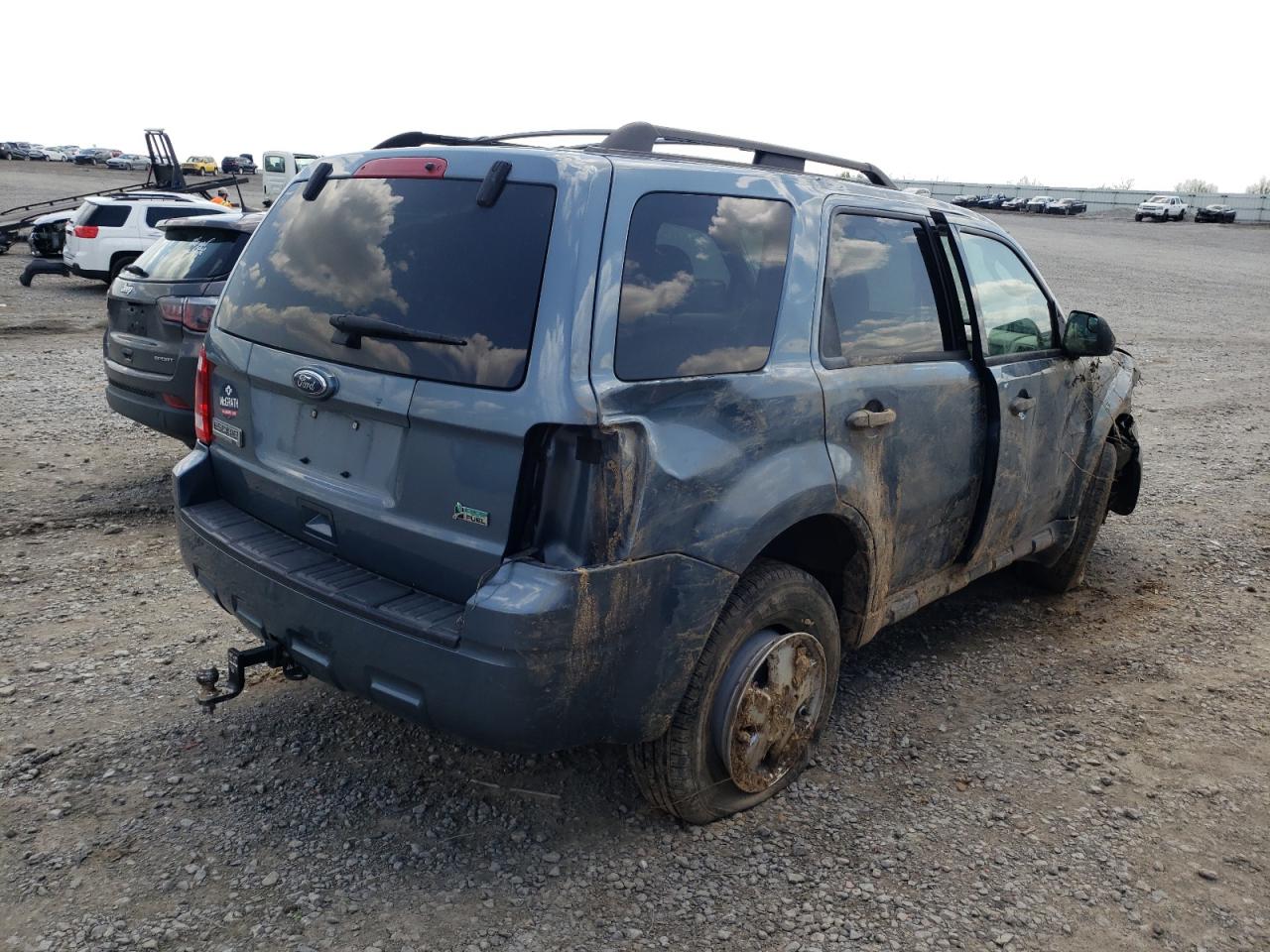 Photo 4 from auction – 2011 FORD ESCAPE with VIN 1FMCU9DGXBKA31546
