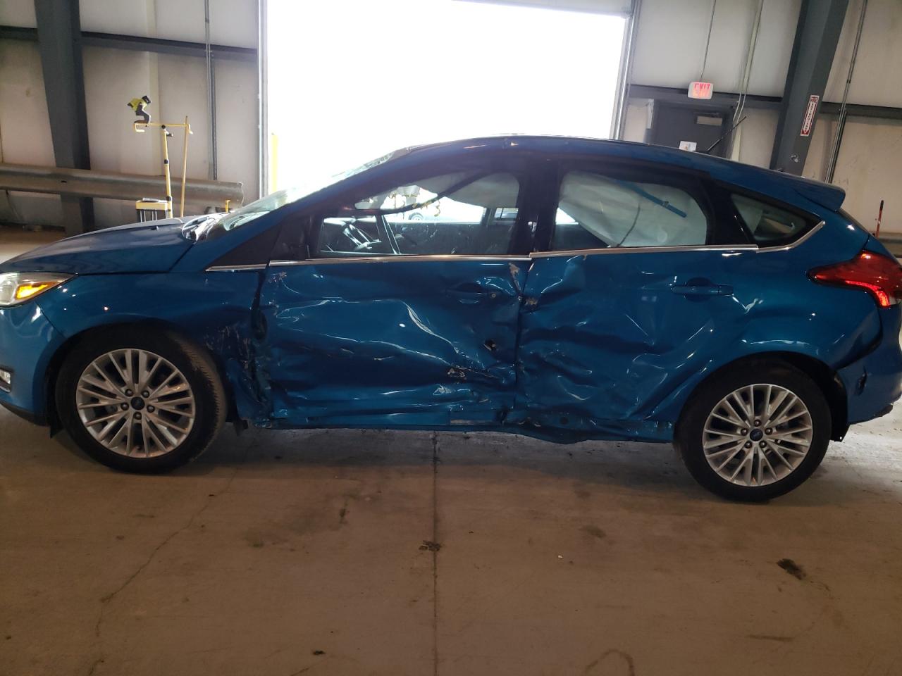 Photo 9 from auction – 2017 FORD FOCUS TITA with VIN 1FADP3N23HL211637