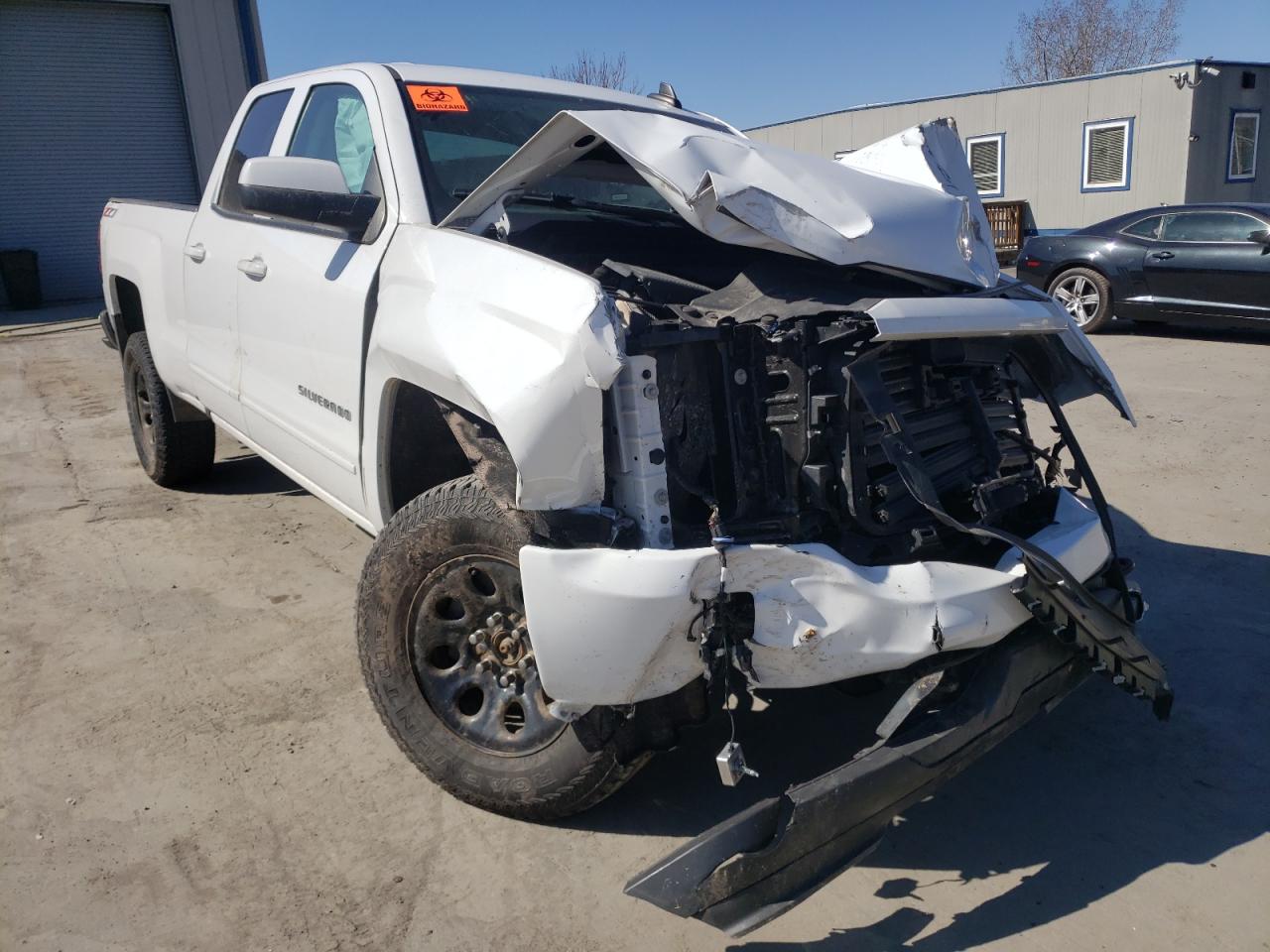 CHEVROLET SILVERADO 2018 with VIN 1GCVKREC5JZ126004 - Photo from auction