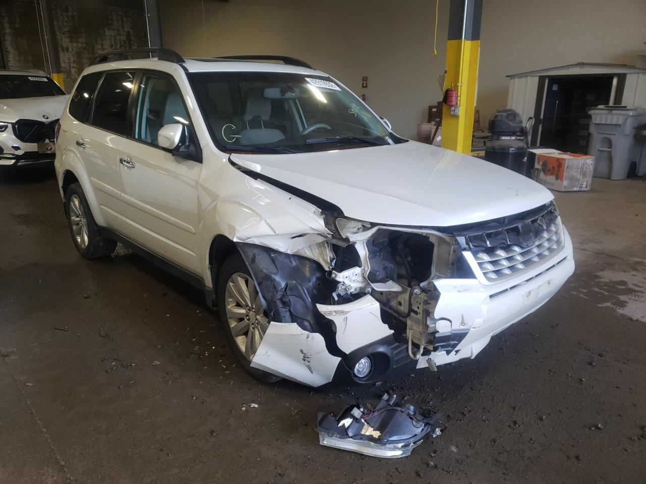 SUBARU FORESTER L 2011 with VIN JF2SHAEC2BH750807 - Photo from auction