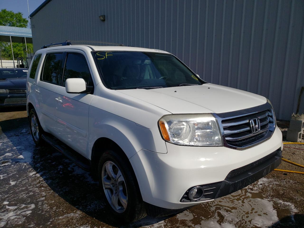 HONDA PILOT EXL 2013 with VIN 5FNYF4H66DB055058 - Photo from auction