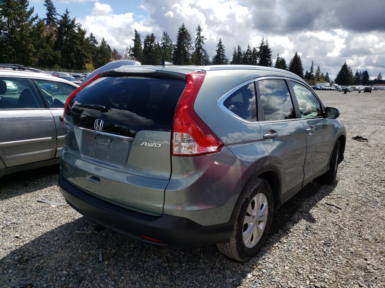 Photo 4 from auction – 2012 HONDA CR-V EXL with VIN JHLRM4H79CC005918