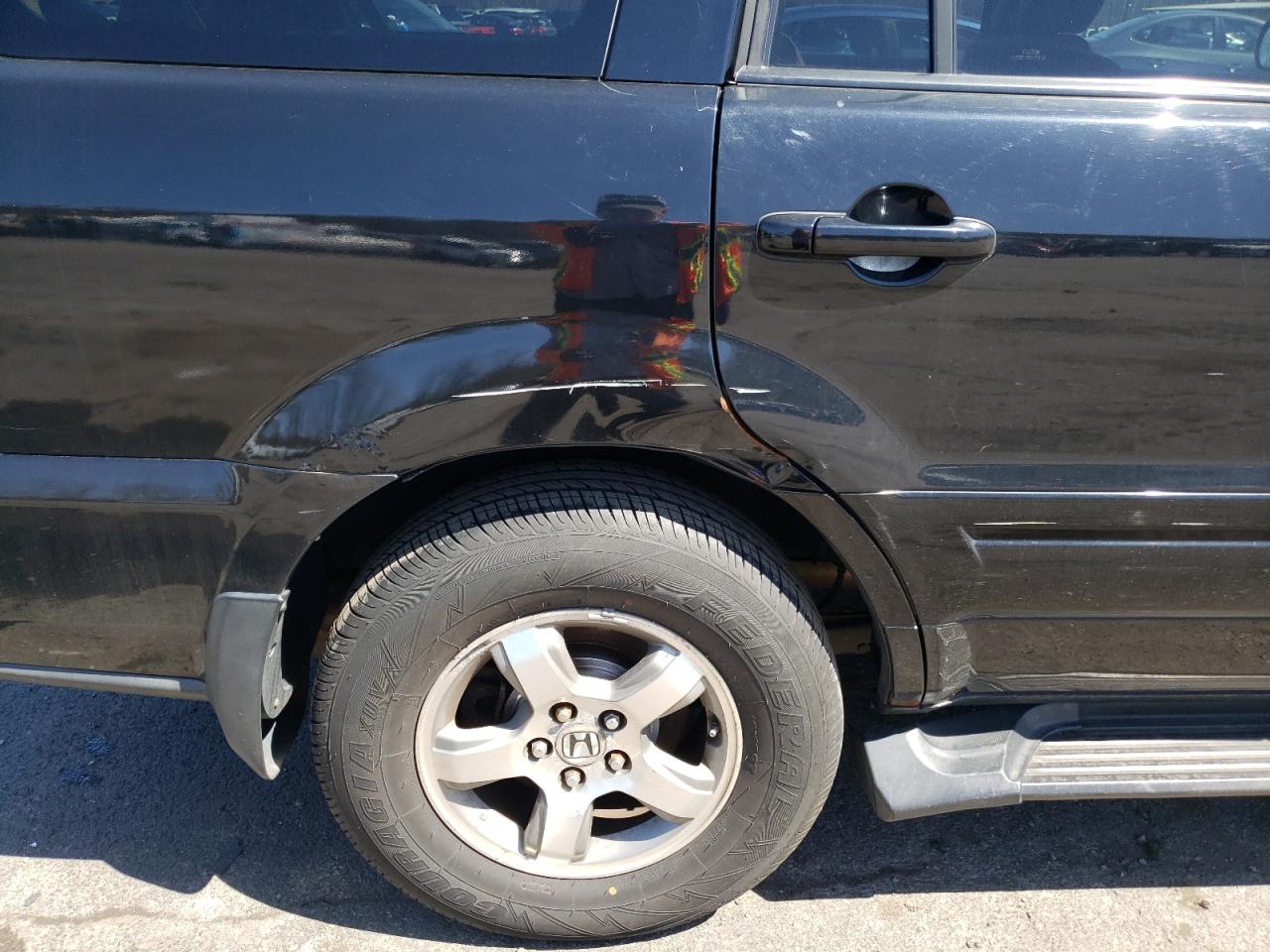 Photo 9 from auction – 2006 HONDA PILOT EX with VIN 2HKYF18446H527968