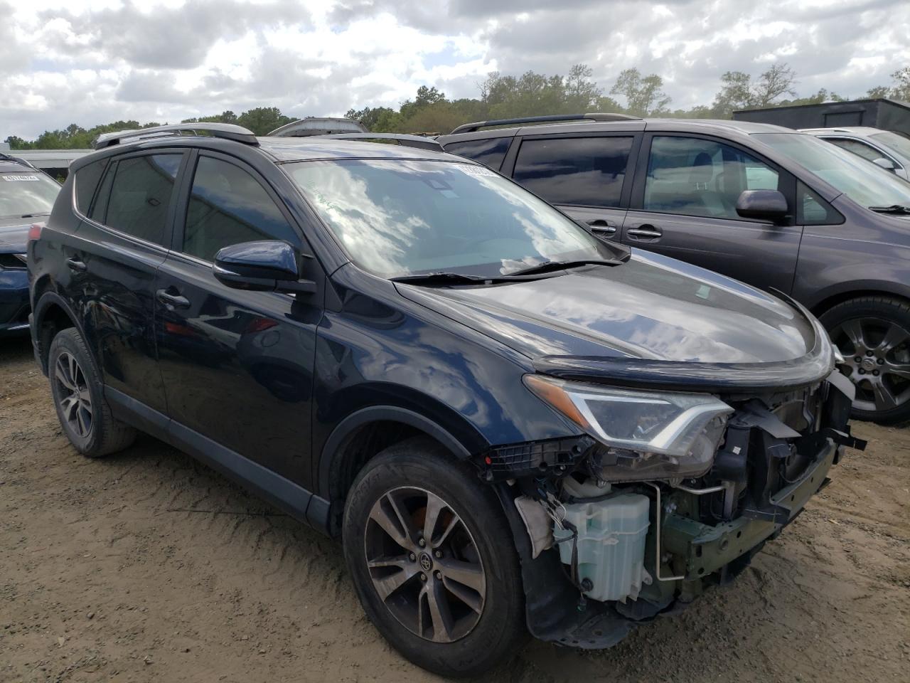 Photo 1 from auction – 2017 TOYOTA RAV4 XLE with VIN 2T3WFREV0HW369398