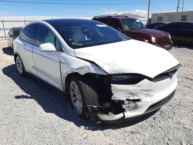 TESLA MODEL X 2017 with VIN 5YJXCAE21HF075129 - Photo from auction