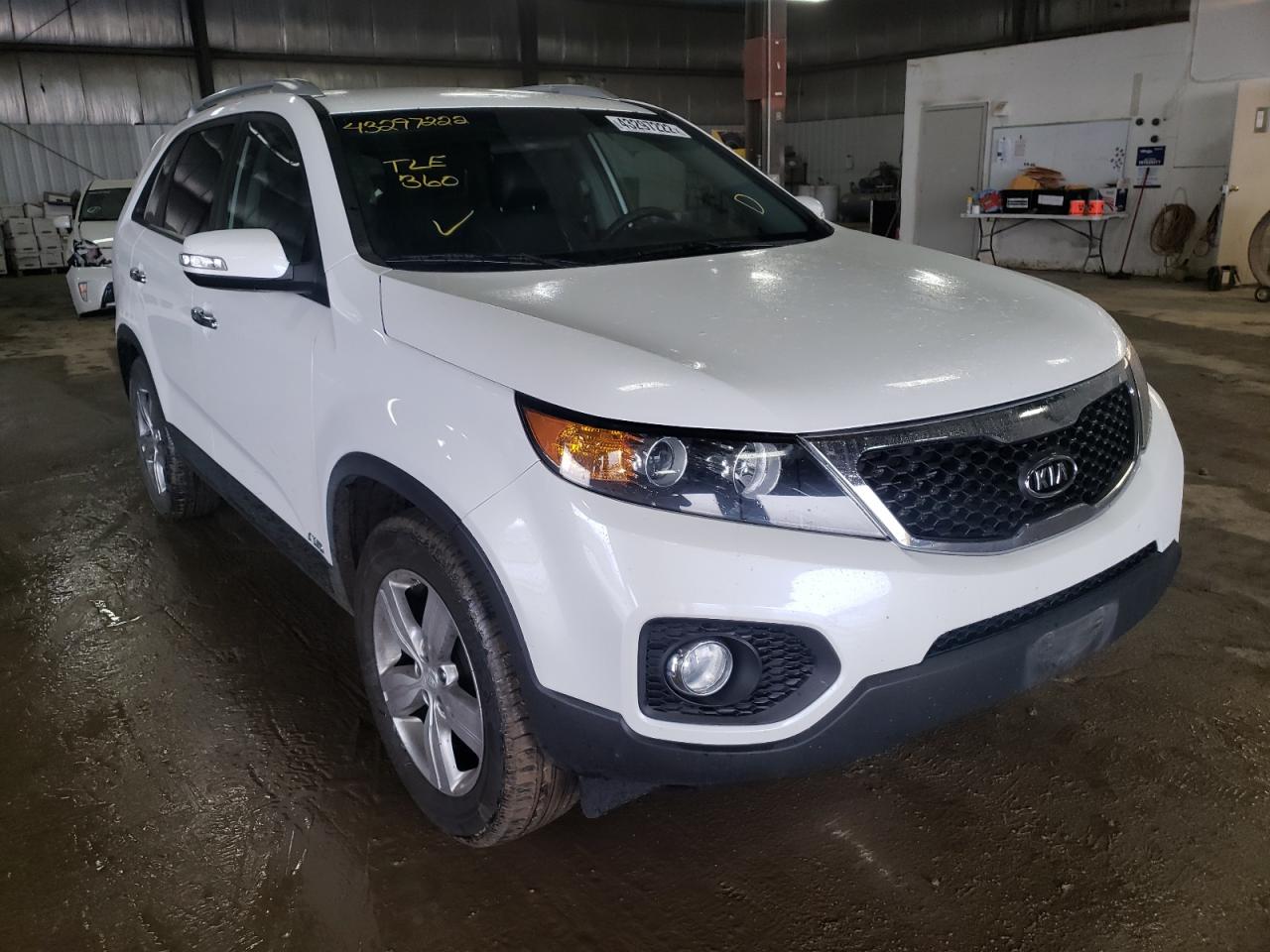 KIA SORENTO EX 2013 with VIN 5XYKUDA25DG321469 - Photo from auction