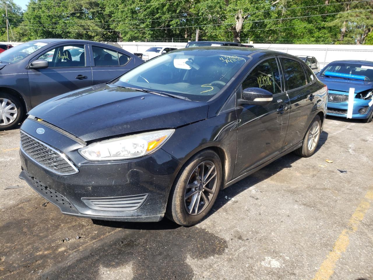 Photo 2 from auction – 2015 FORD FOCUS SE with VIN 1FADP3F23FL342367