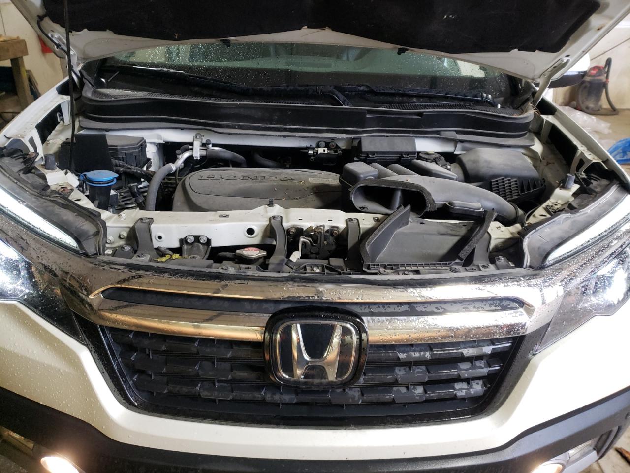 Photo 7 from auction – 2019 HONDA RIDGELINE with VIN 5FPYK3F77KB004495