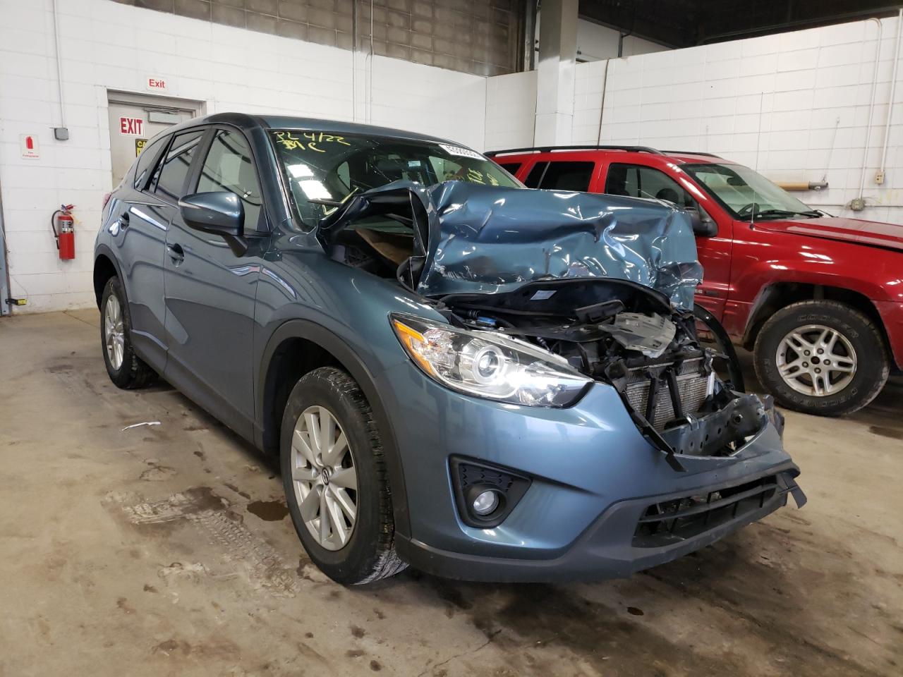 MAZDA CX-5 TOURI 2015 with VIN JM3KE4CY8F0467685 - Photo from auction