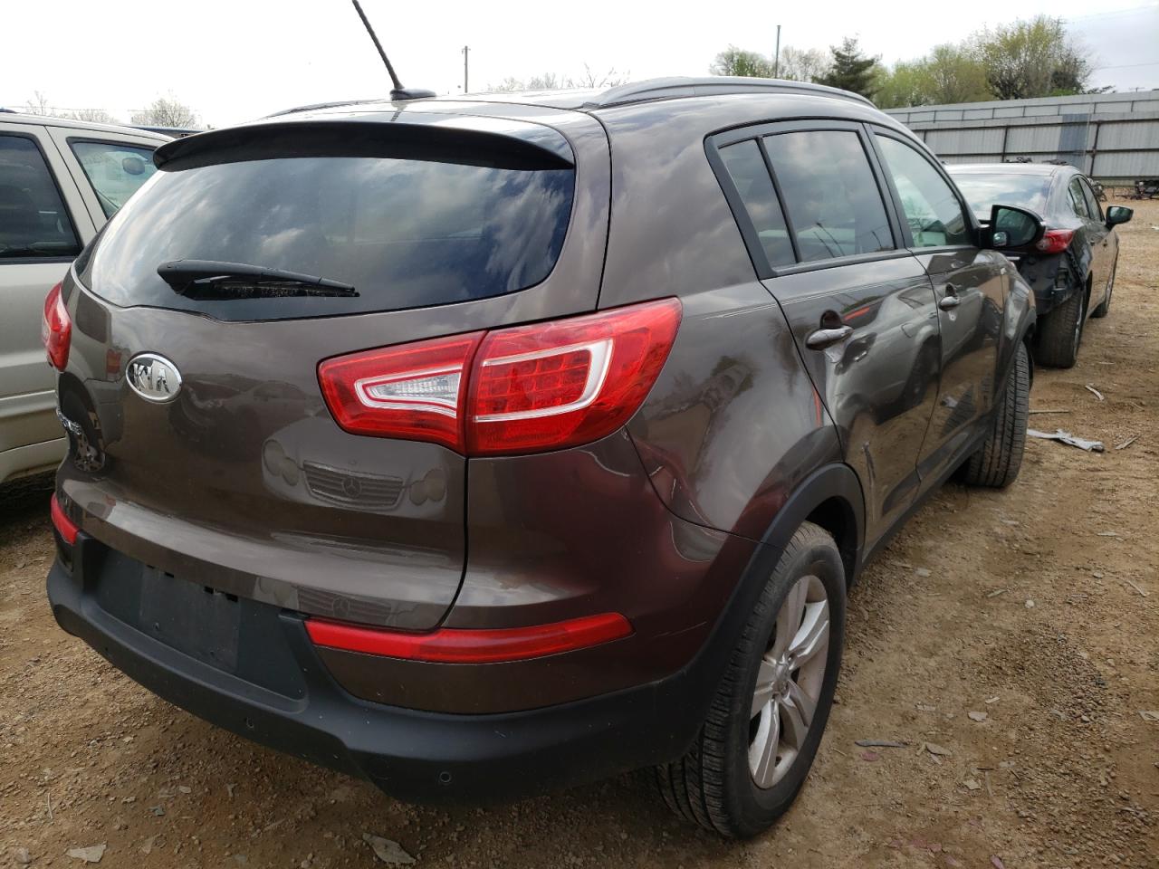 Photo 4 from auction – 2012 KIA SPORTAGE L with VIN KNDPBCA27C7234089