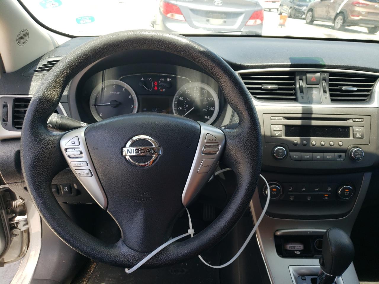 Photo 9 from auction – 2014 NISSAN SENTRA S with VIN 3N1AB7AP8EL607182