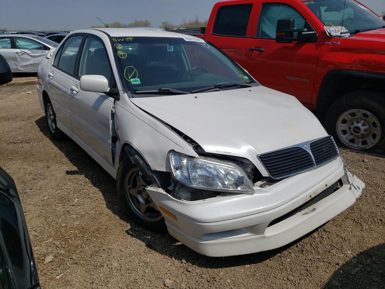 MITSUBISHI LANCER OZ 2003 with VIN JA3AJ86E73U117668 - Photo from auction