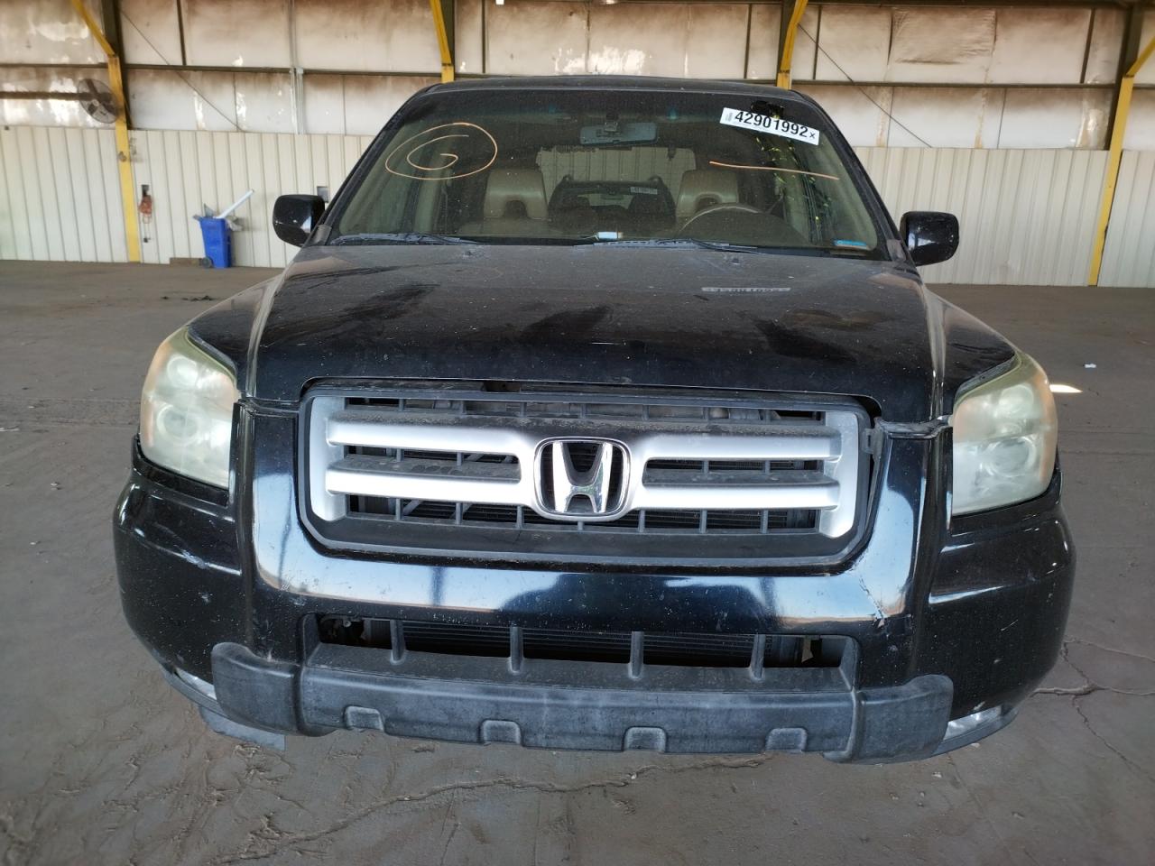Photo 9 from auction – 2006 HONDA PILOT EX with VIN 2HKYF18596H540921