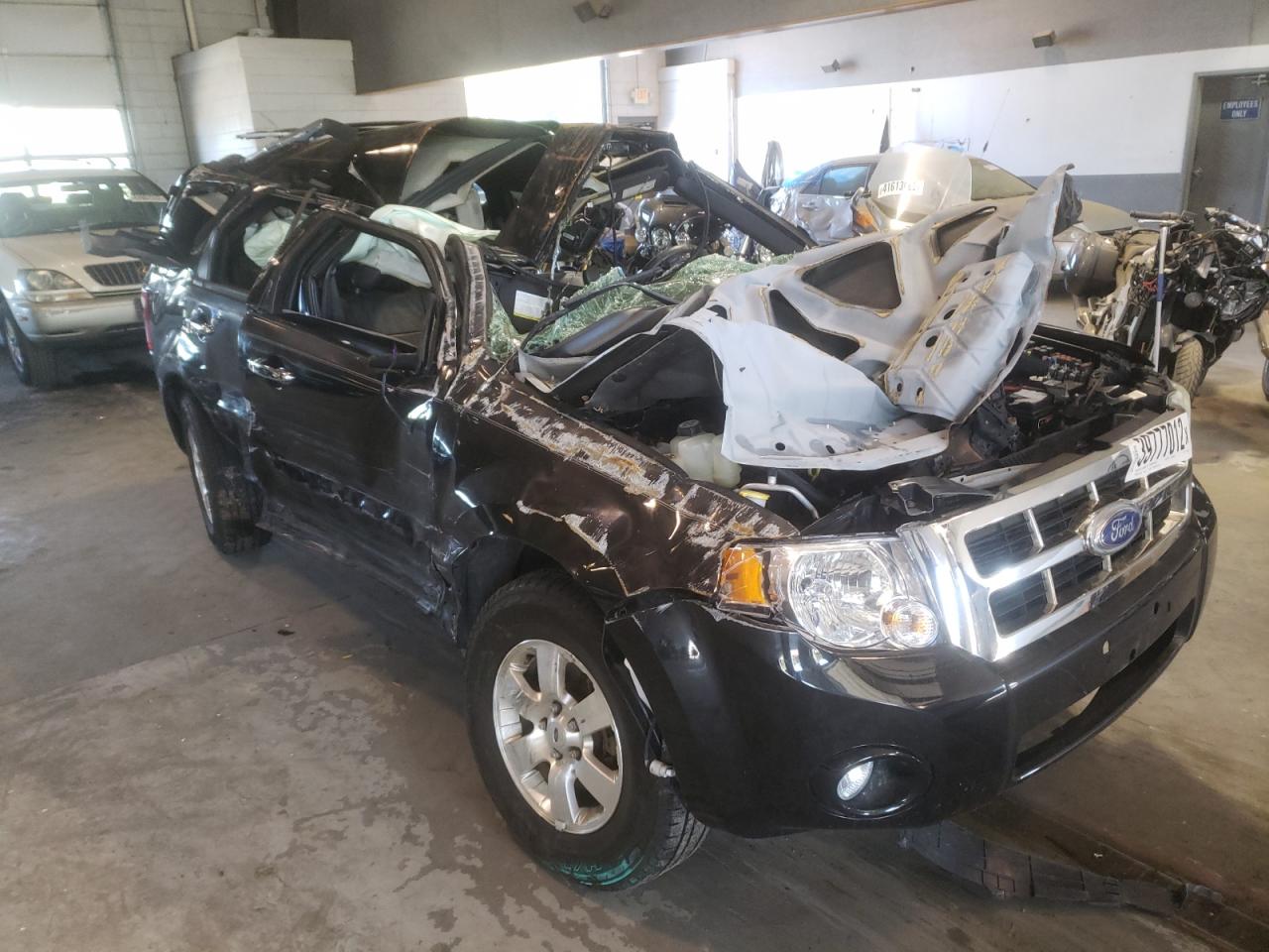 Photo 9 from auction – 2011 FORD ESCAPE LIM with VIN 1FMCU0E71BKC01268