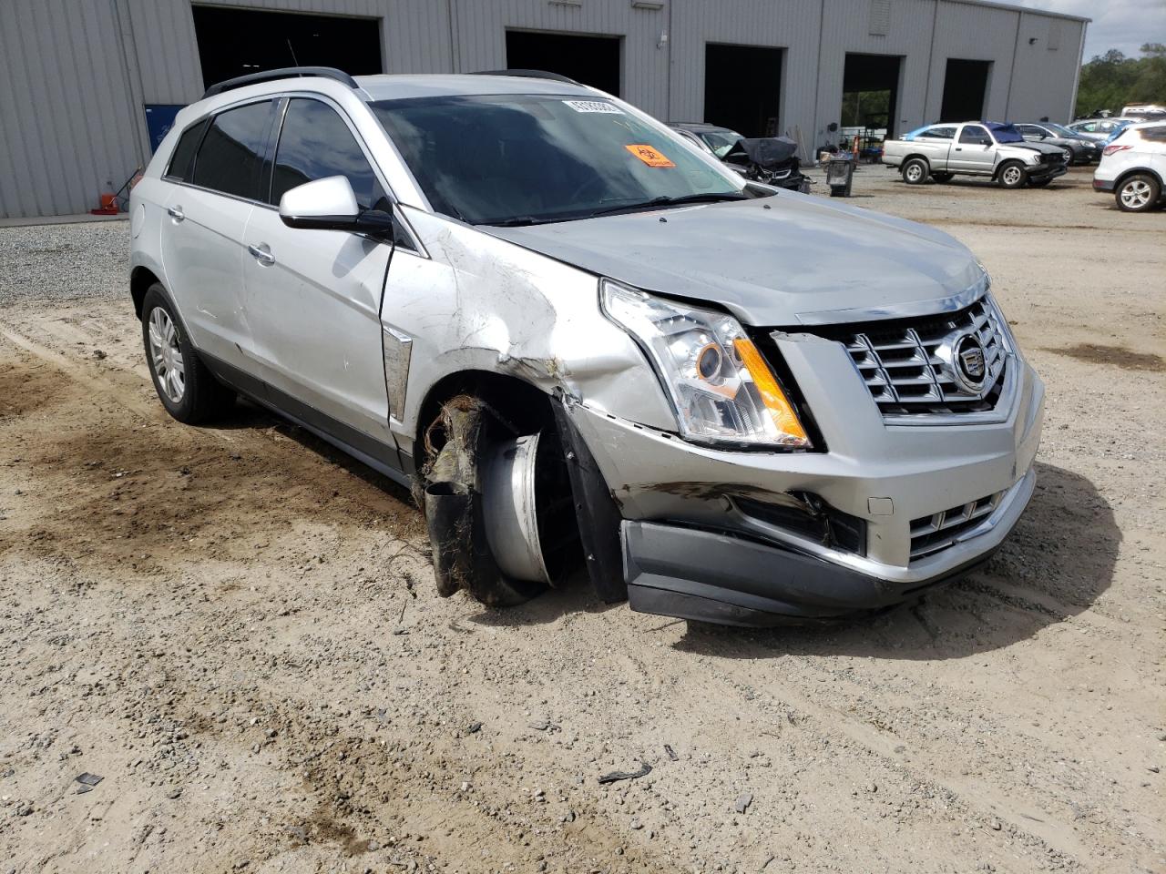 CADILLAC SRX 2013 with VIN 3GYFNAE35DS509529 - Photo from auction