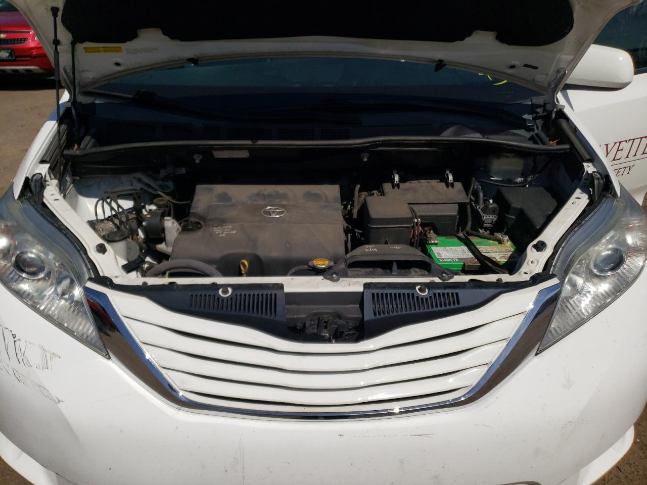 Photo 7 from auction – 2015 TOYOTA SIENNA LE with VIN 5TDJK3DC5FS128230