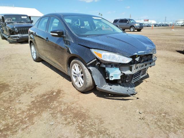 FORD FOCUS SE 2017 with VIN 1FADP3F26HL266582 - Photo from auction