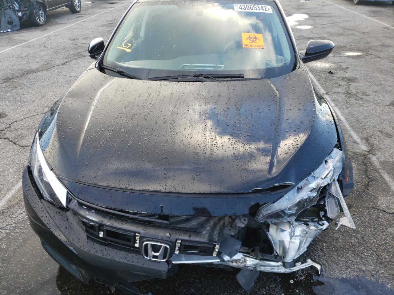 Photo 9 from auction – 2018 HONDA CIVIC LX with VIN 2HGFC2F55JH607915