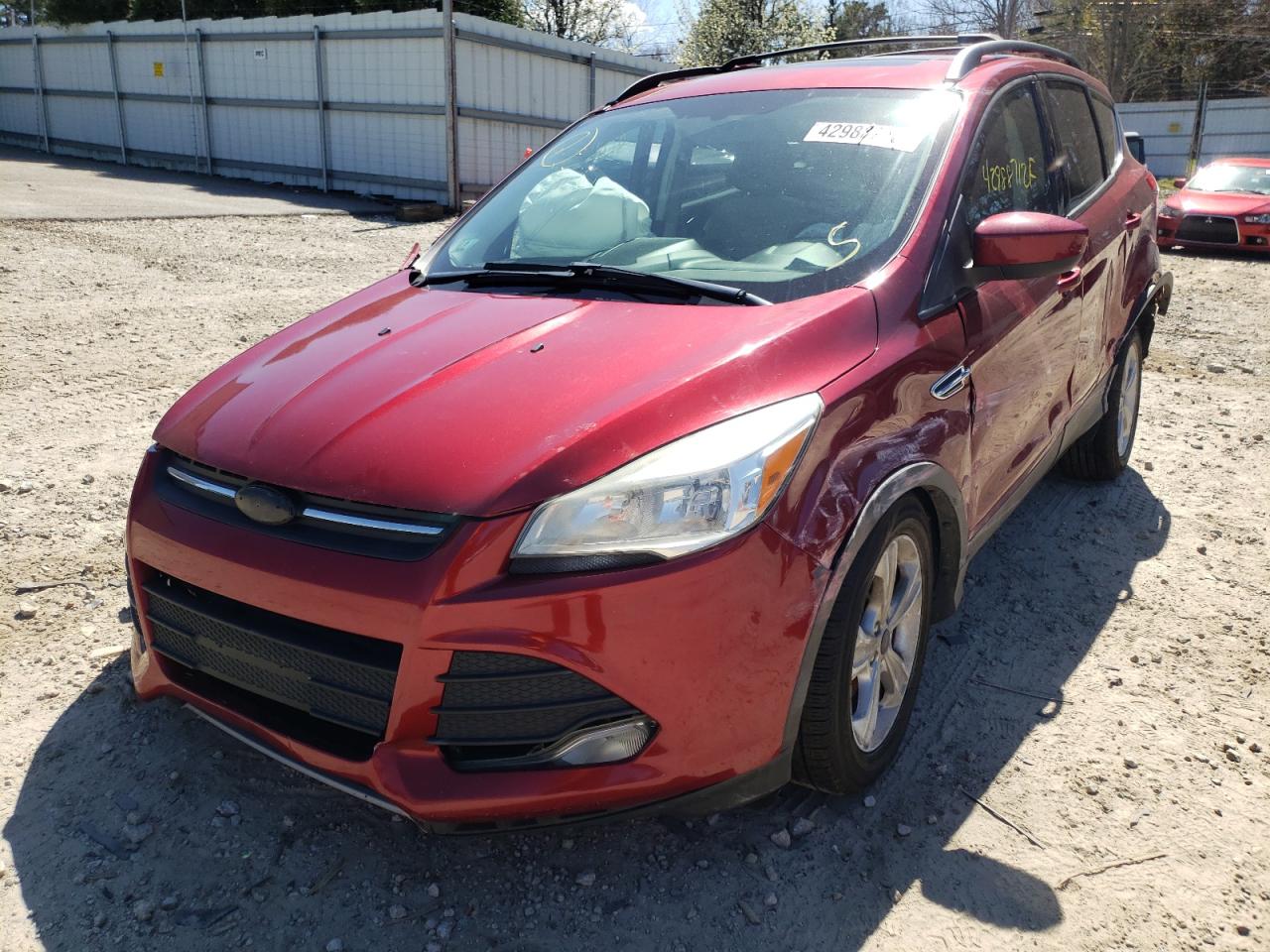 Photo 2 from auction – 2013 FORD ESCAPE SE with VIN 1FMCU9GX7DUC06130