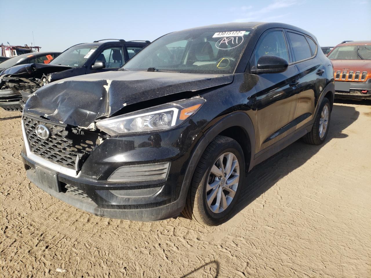 Photo 2 from auction – 2019 HYUNDAI TUCSON SE with VIN KM8J2CA41KU867903