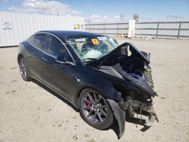 TESLA MODEL 3 2018 with VIN 5YJ3E1EB7JF113185 - Photo from auction