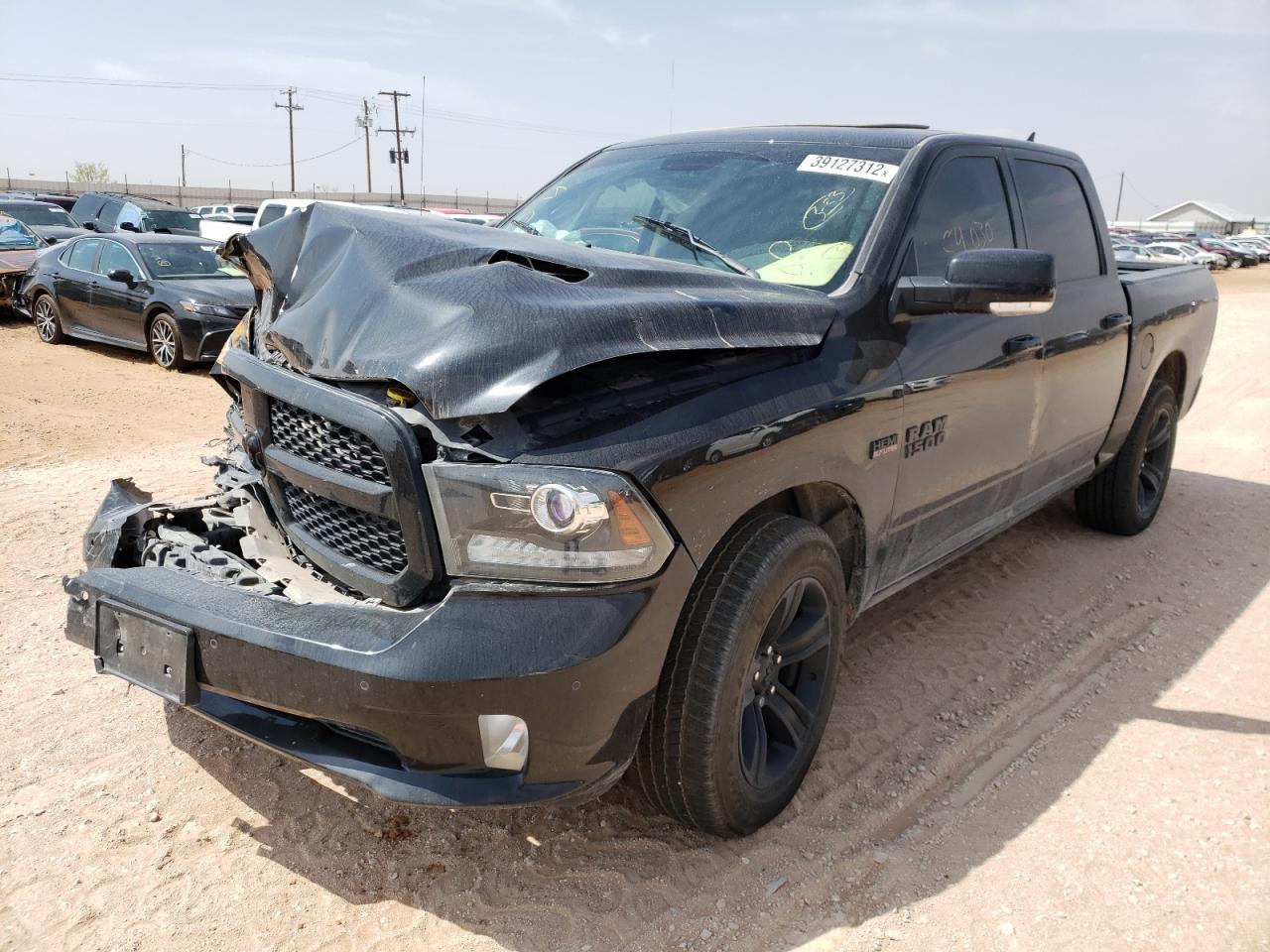 Photo 2 from auction – 2019 RAM 1500 TRADE with VIN 1C6SRFGT2KN561752