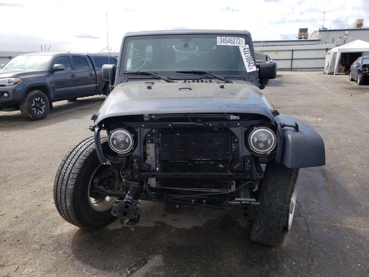 Photo 9 from auction – 2016 JEEP WRANGLER U with VIN 1C4BJWDG2GL315648