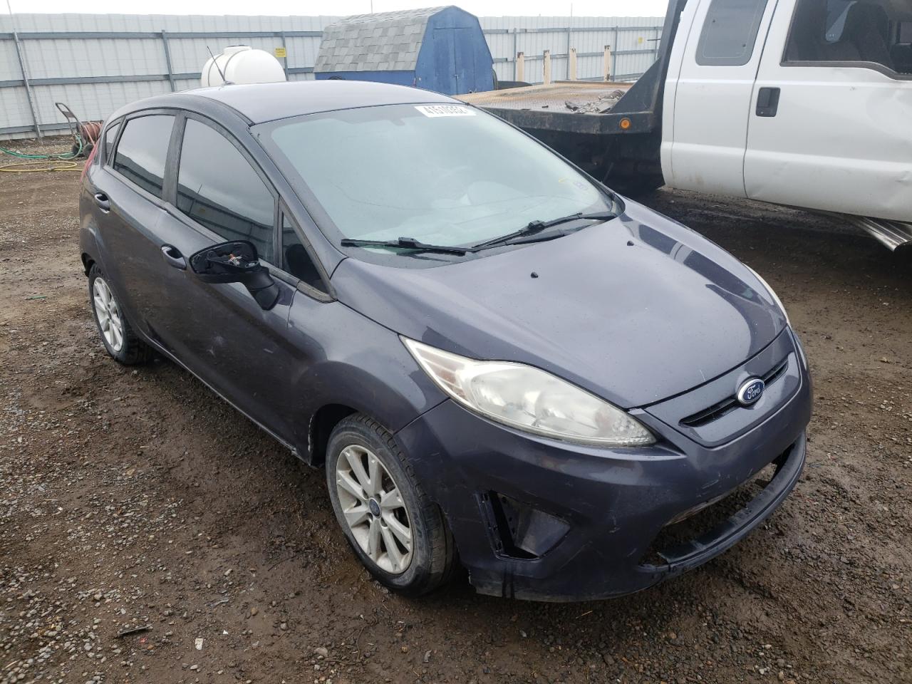 FORD FIESTA 2013 with VIN 3FADP4EJ1DM205017 - Photo from auction