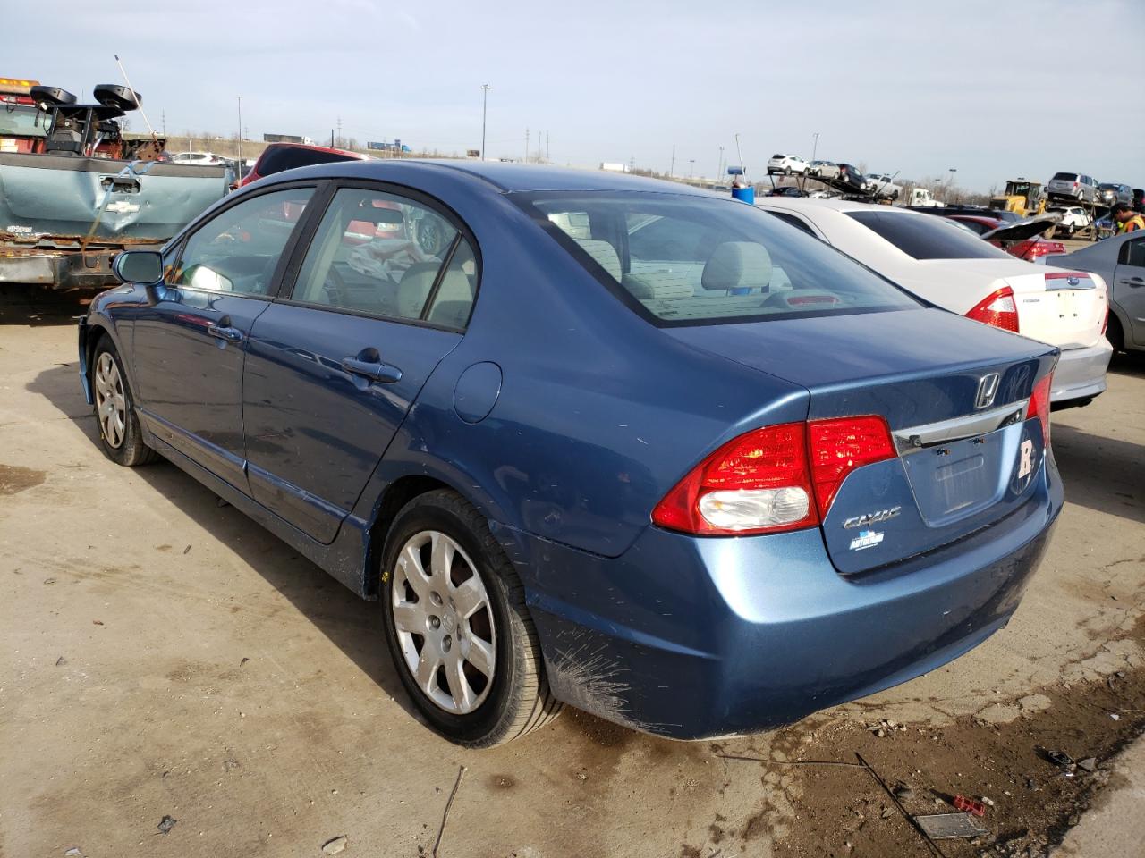Photo 3 from auction – 2011 HONDA CIVIC LX with VIN 19XFA1F59BE046579