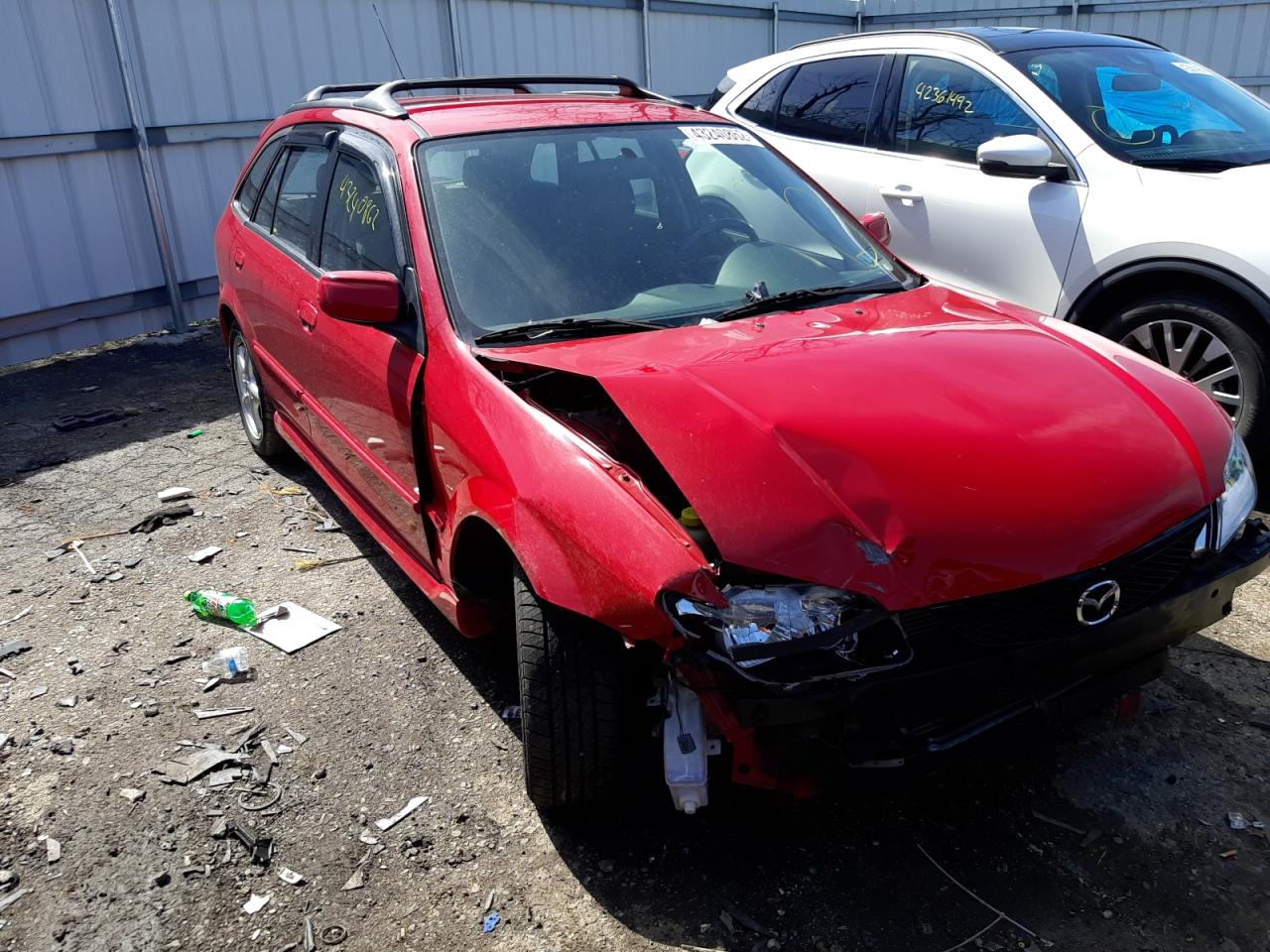 MAZDA PROTEGE PR 2002 with VIN JM1BJ245X21455023 - Photo from auction