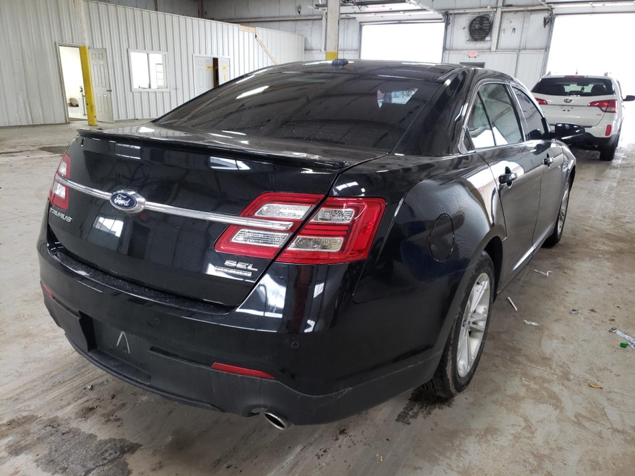 Photo 14 from auction – 2016 FORD TAURUS SEL with VIN 1FAHP2E81GG140848
