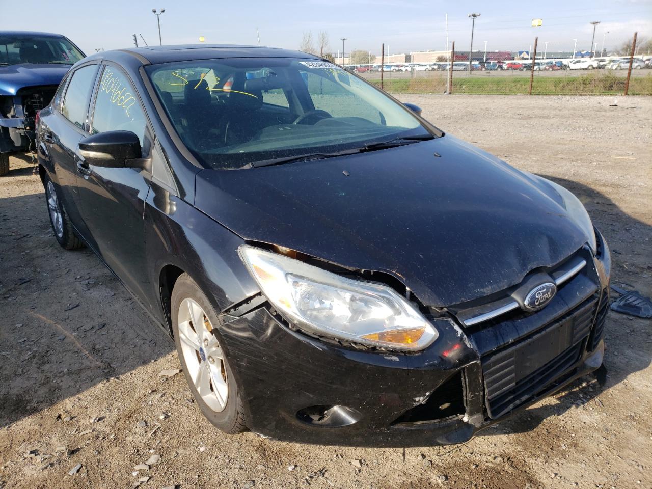 FORD FOCUS SE 2014 with VIN 1FADP3F2XEL339562 - Photo from auction