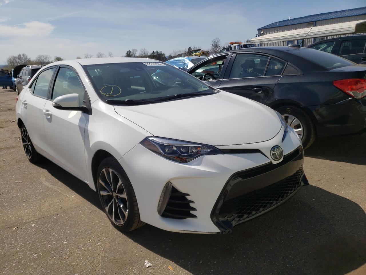 TOYOTA COROLLA L 2017 with VIN 2T1BURHE9HC860191 - Photo from auction