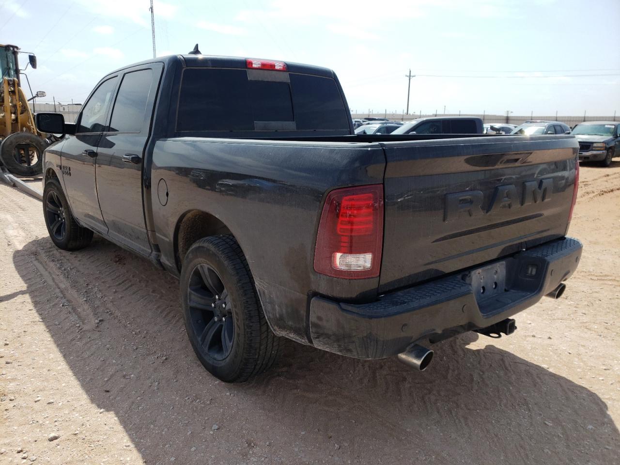 Photo 3 from auction – 2019 RAM 1500 TRADE with VIN 1C6SRFGT2KN561752
