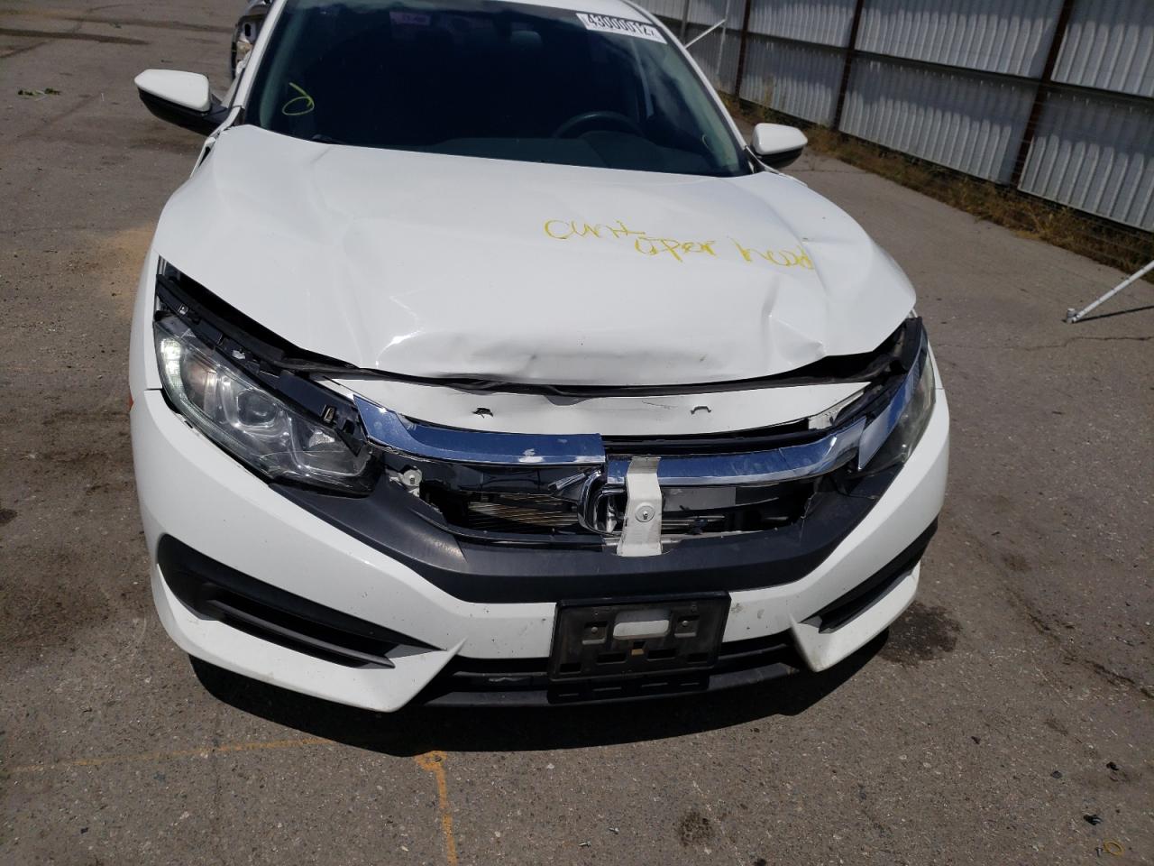 Photo 9 from auction – 2016 HONDA CIVIC LX with VIN 2HGFC2F54GH562152