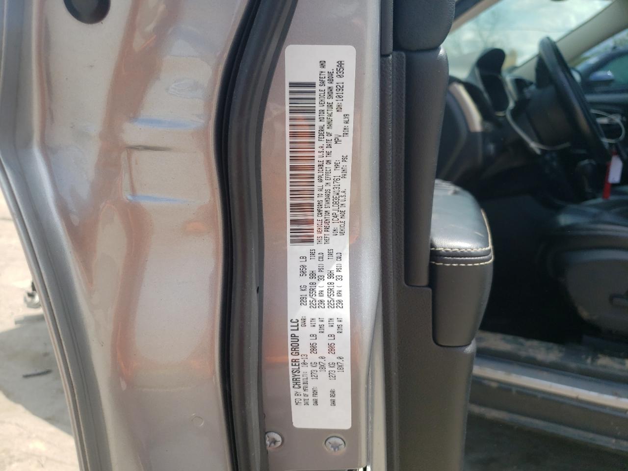 Photo 10 from auction – 2014 JEEP CHEROKEE L with VIN 1C4PJLDB3EW131761