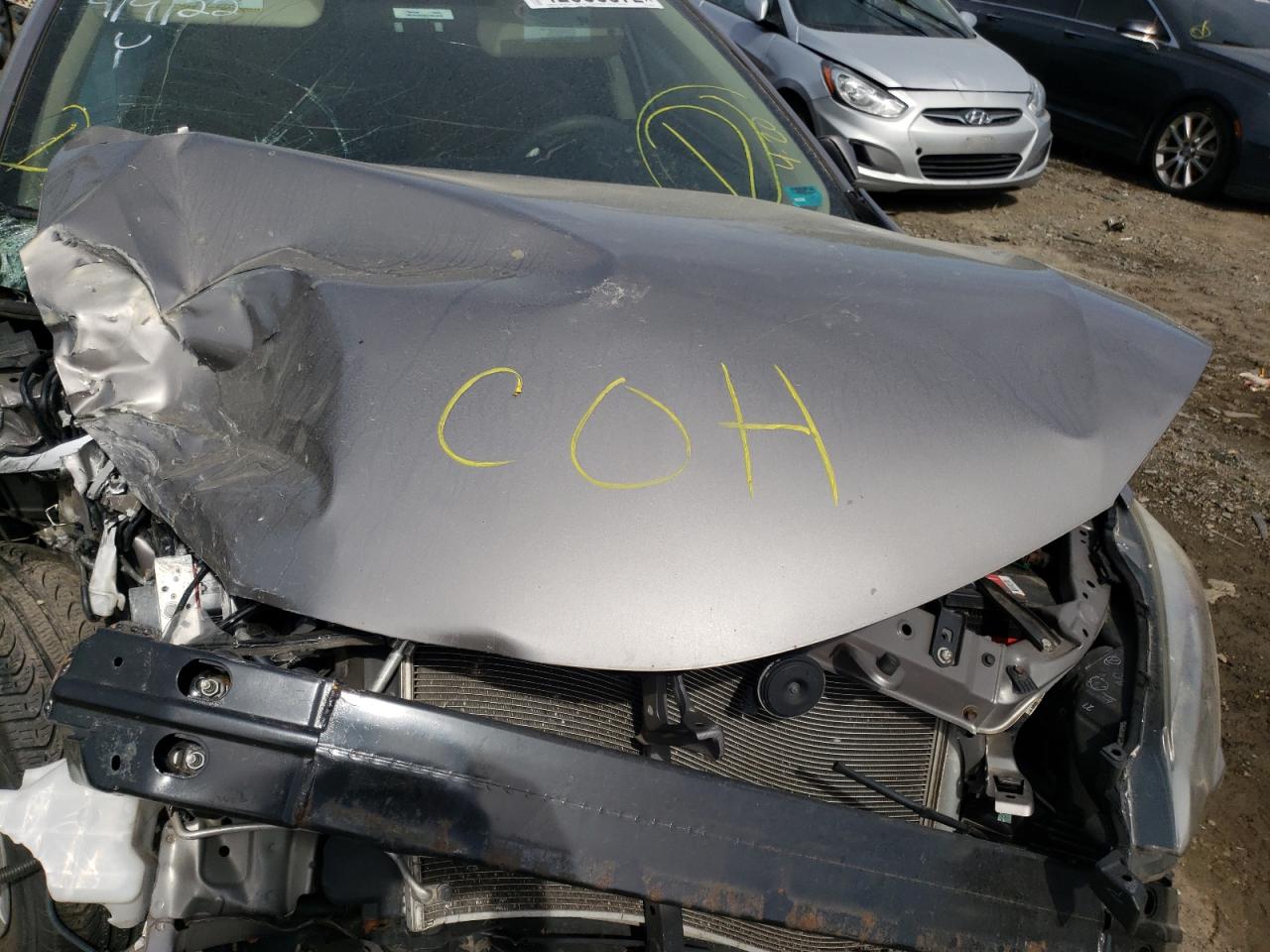Photo 7 from auction – 2014 TOYOTA COROLLA EC with VIN 2T1BPRHE3EC002007