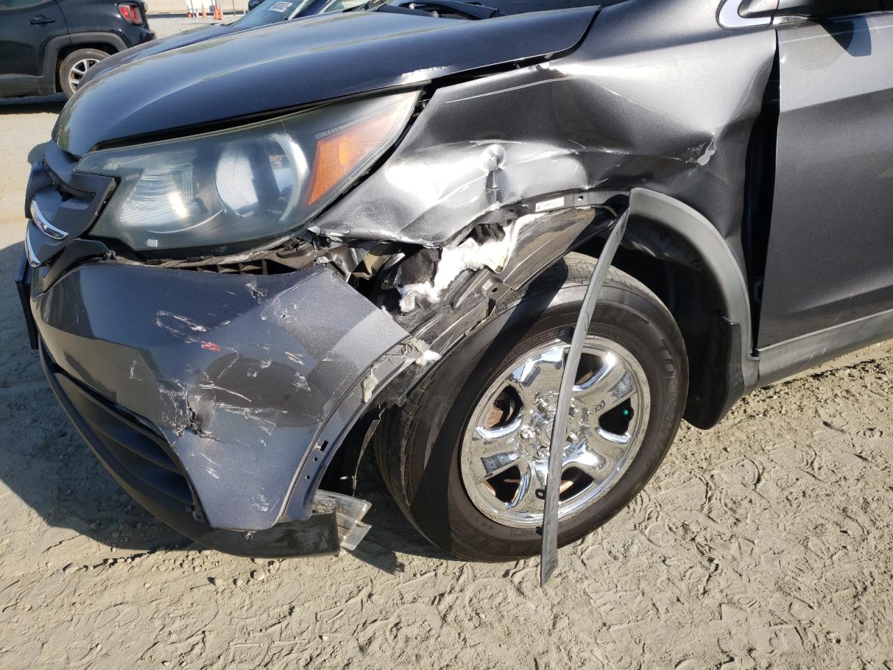 Photo 9 from auction – 2012 HONDA CR-V LX with VIN 2HKRM3H35CH504188
