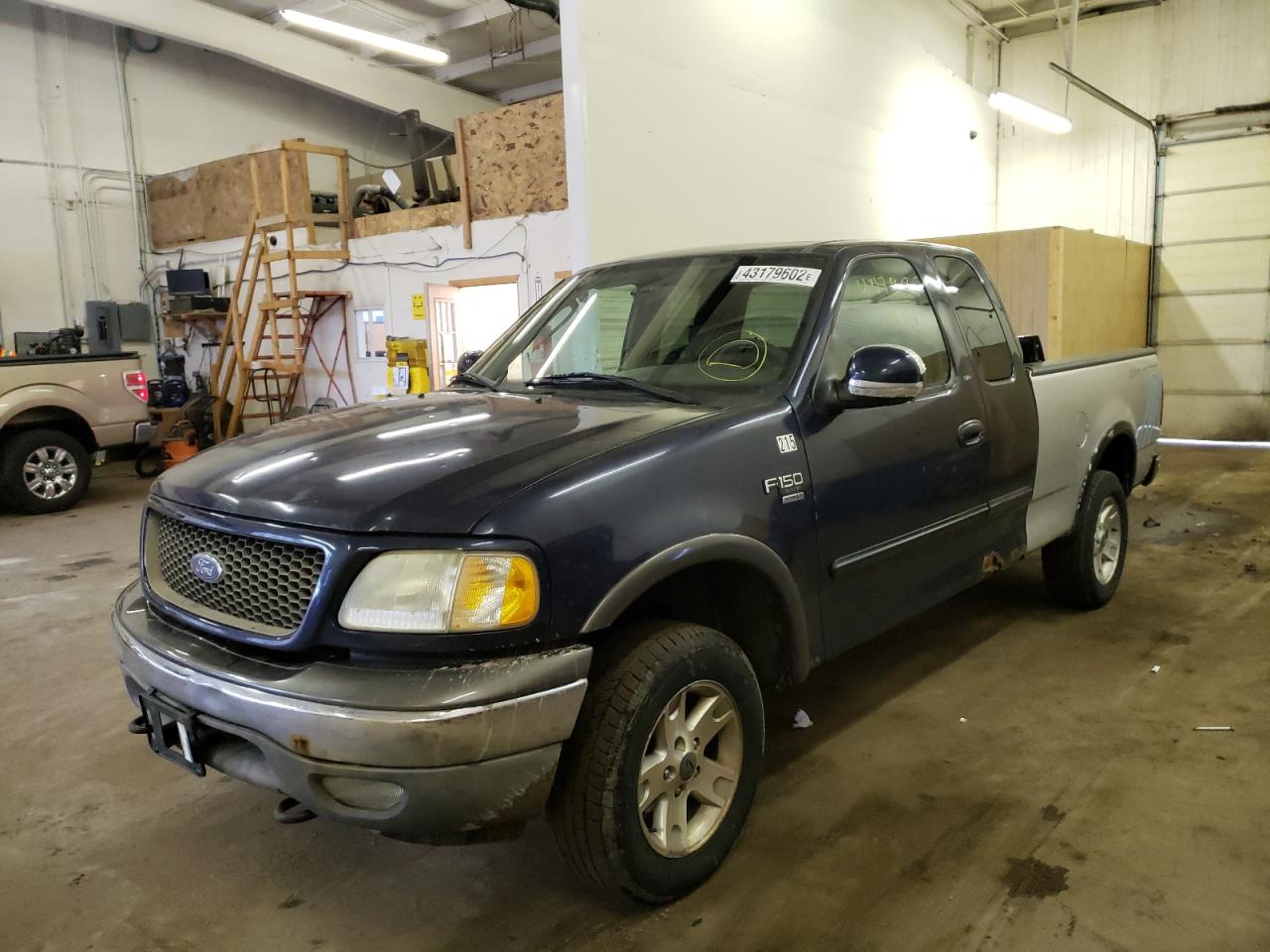 Photo 2 from auction – 2003 FORD F150 with VIN 1FTRX18L63NA13012