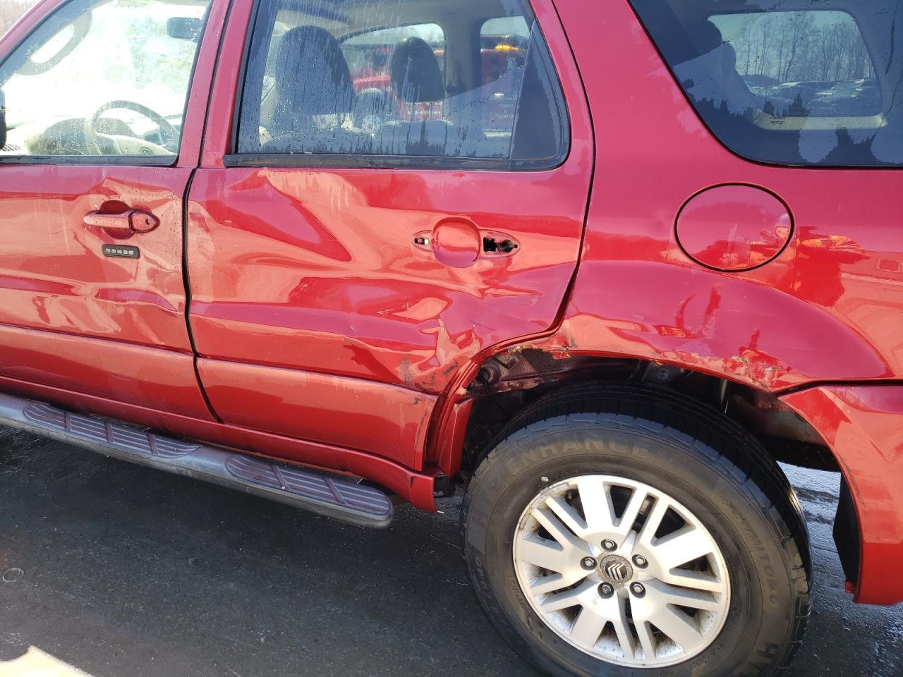 Photo 9 from auction – 2006 MERCURY MARINER with VIN 4M2CU57186KJ06314
