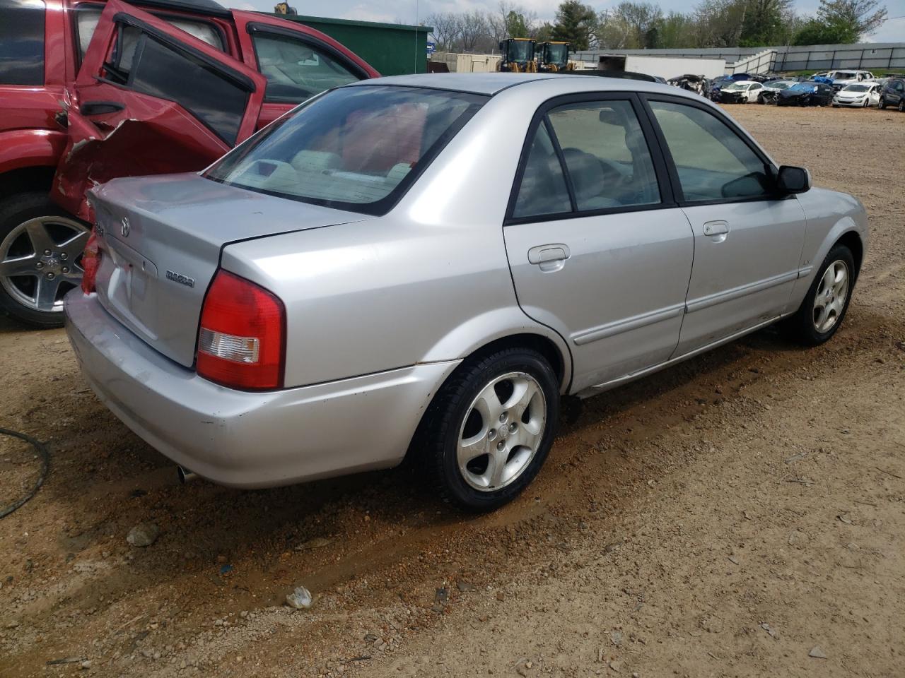 Photo 4 from auction – 2002 MAZDA PROTEGE DX with VIN JM1BJ225621574724
