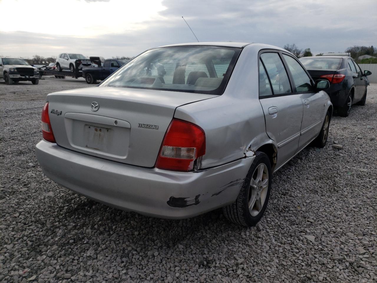Photo 4 from auction – 2003 MAZDA PROTEGE DX with VIN JM1BJ225830121311
