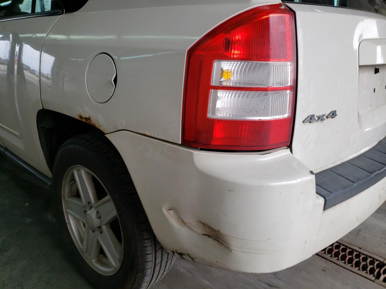 Photo 9 from auction – 2010 JEEP COMPASS SP with VIN 1J4NF4FB8AD501761