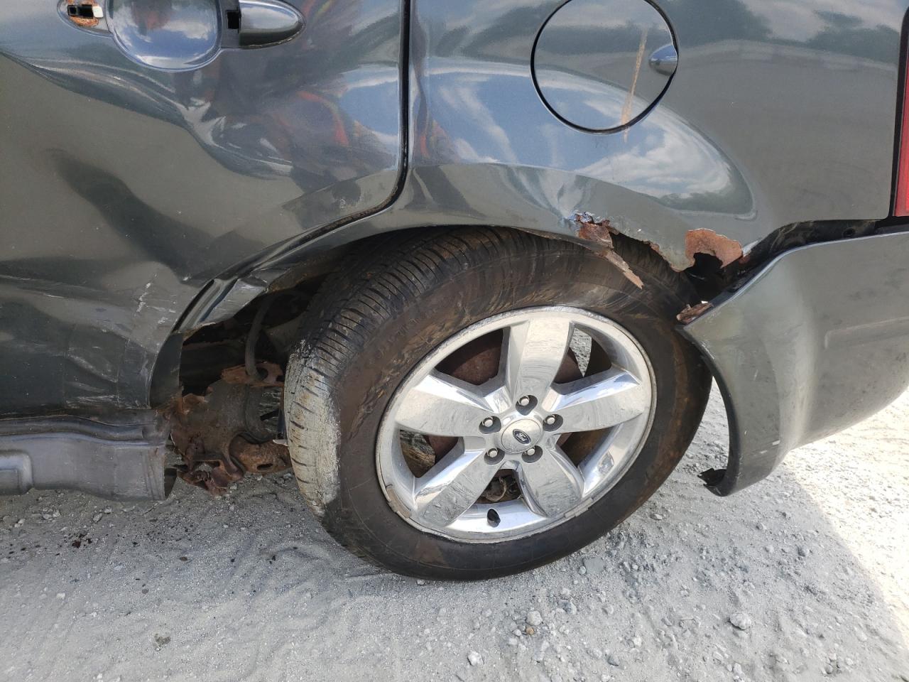 Photo 9 from auction – 2008 FORD ESCAPE LIM with VIN 1FMCU94158KA00080
