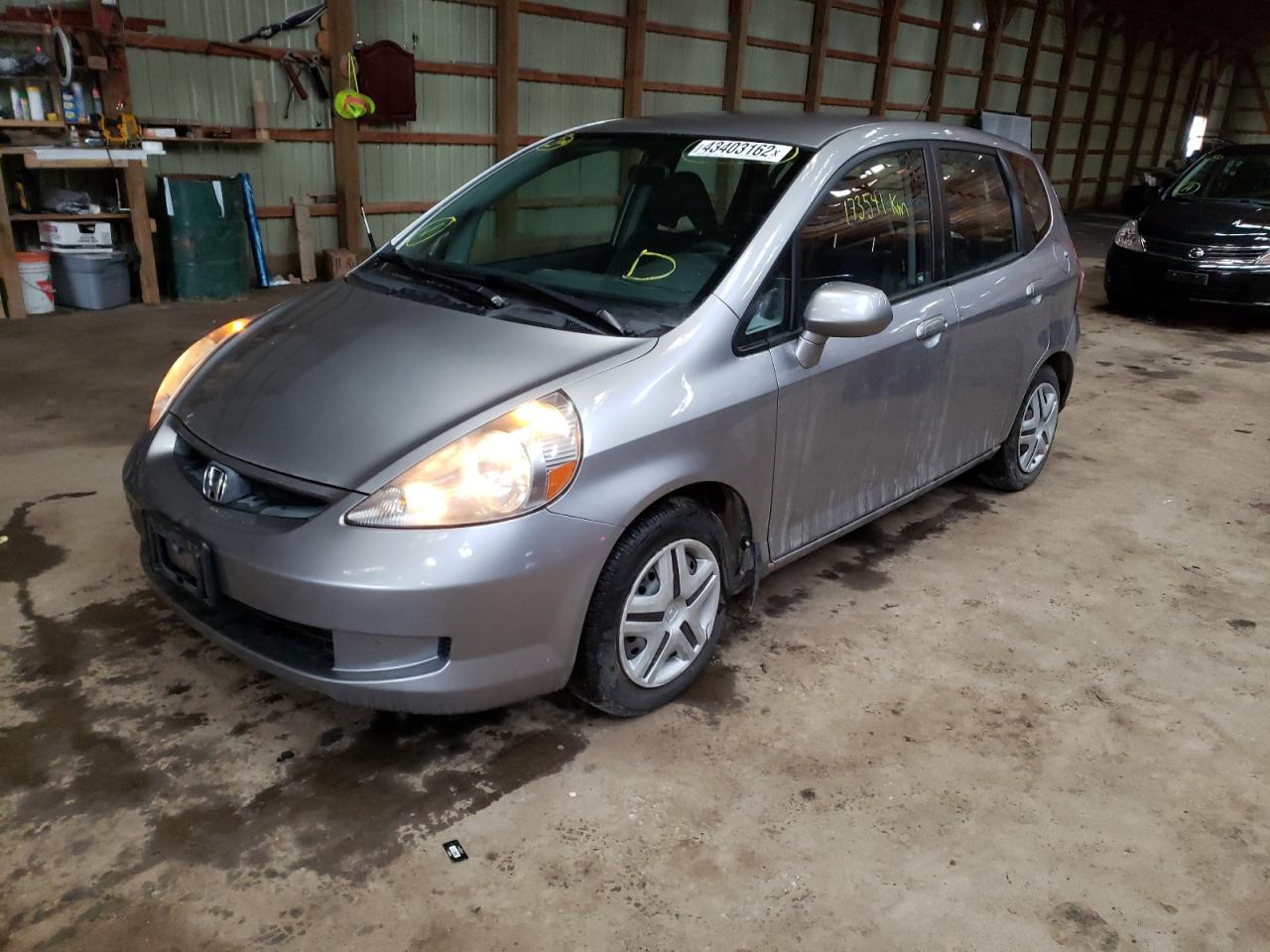 Photo 2 from auction – 2007 HONDA FIT with VIN JHMGD37437S818588
