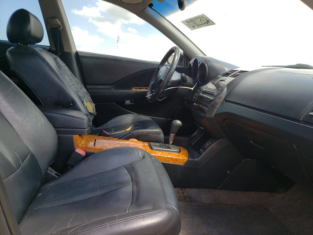 Photo 5 from auction – 2002 NISSAN ALTIMA SE with VIN 1N4BL11E92C144475