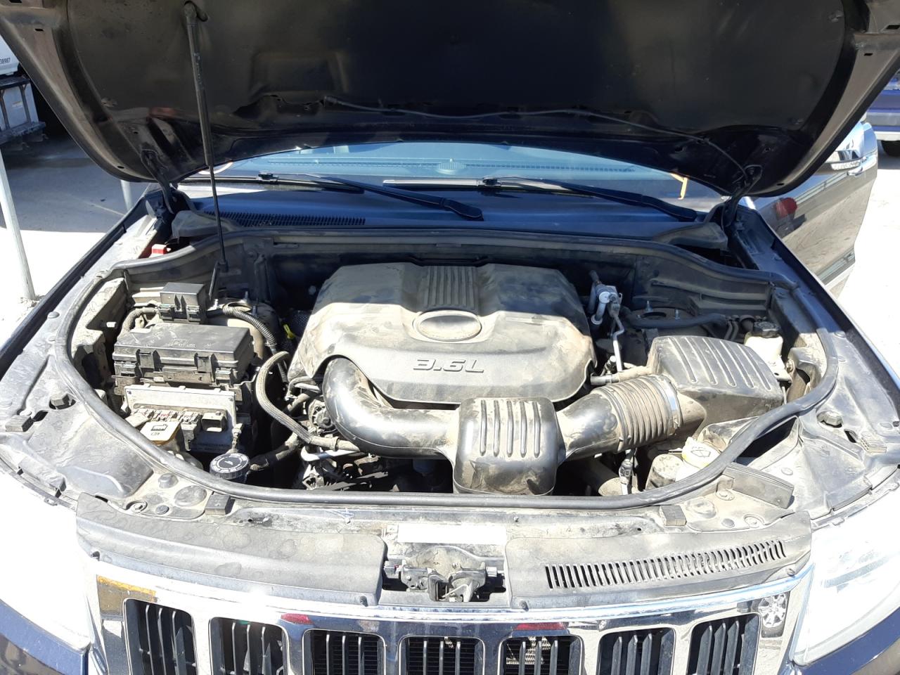 Photo 7 from auction – 2011 JEEP GRAND CHER with VIN 1J4RS5GG9BC650961