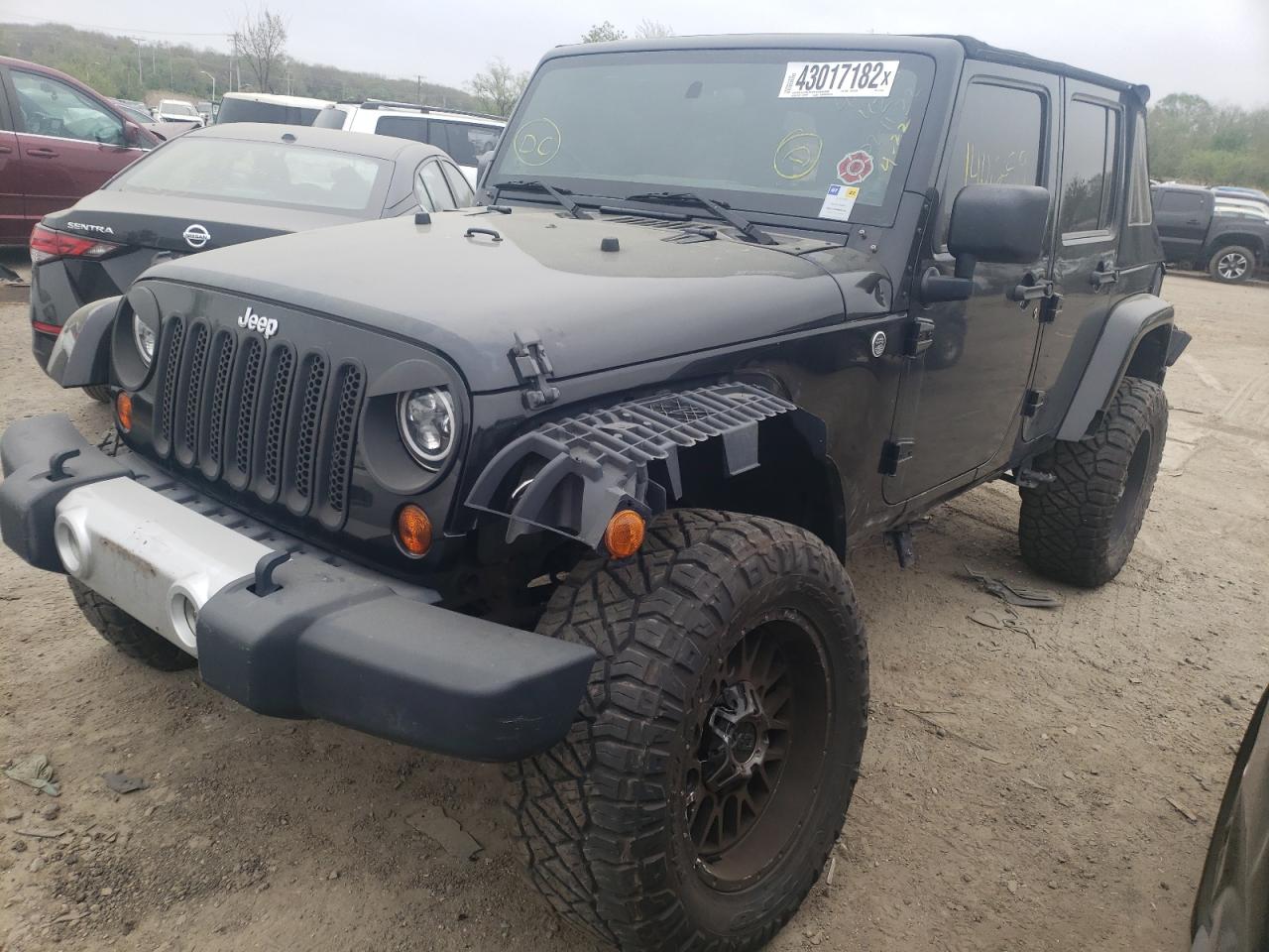 Photo 2 from auction – 2011 JEEP WRANGLER U with VIN 1J4BA5H11BL577664