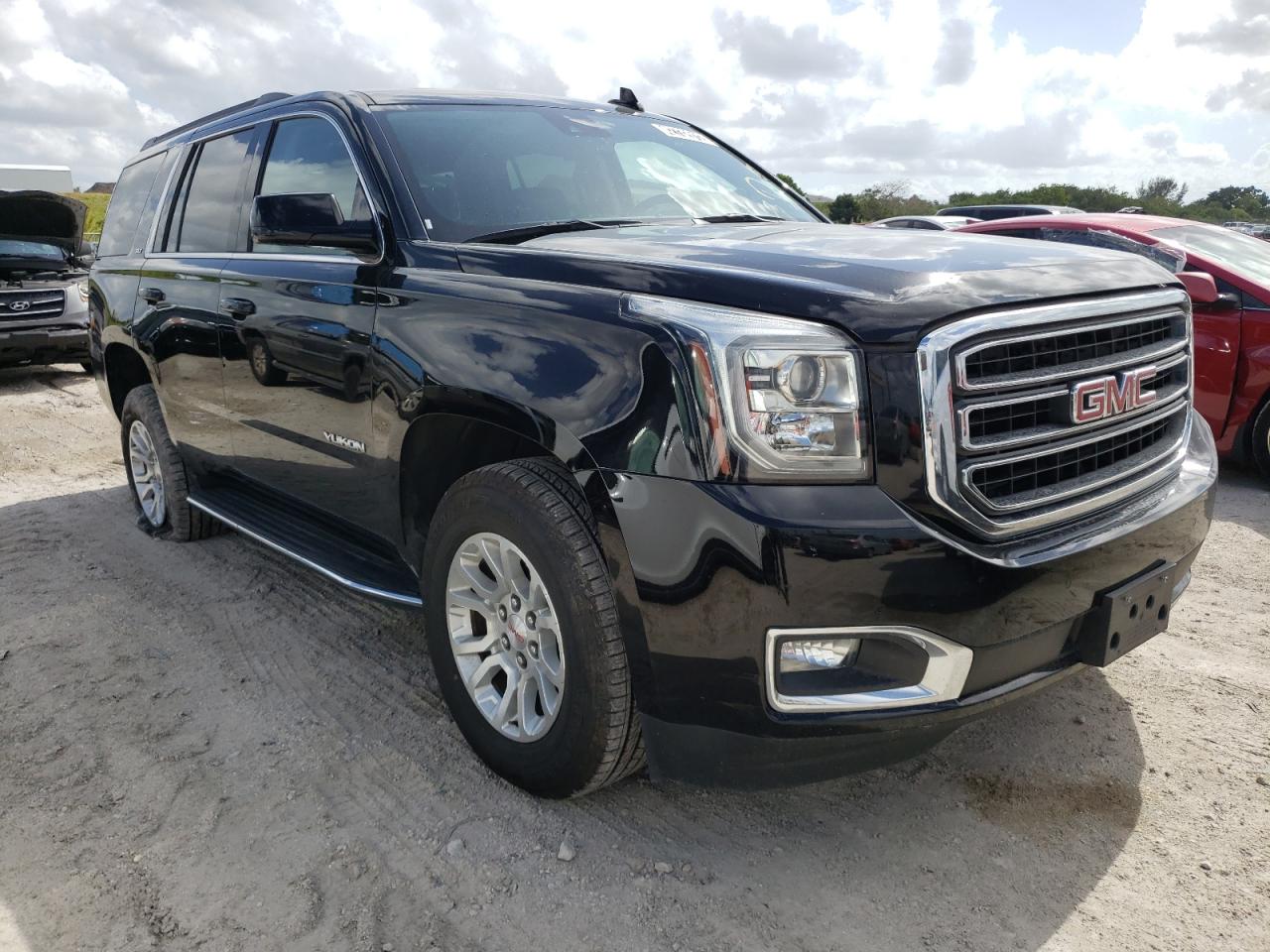 GMC YUKON SLT 2020 with VIN 1GKS2BKC9LR274033 - Photo from auction